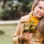 woman-holding-bunch-leaves_23-2148619440